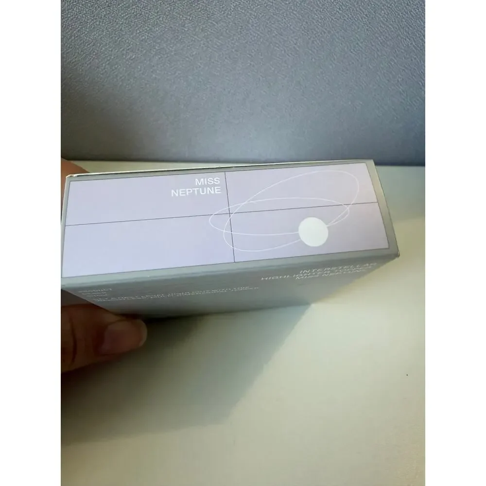 r.e.m. beauty highlighter in miss neptune
